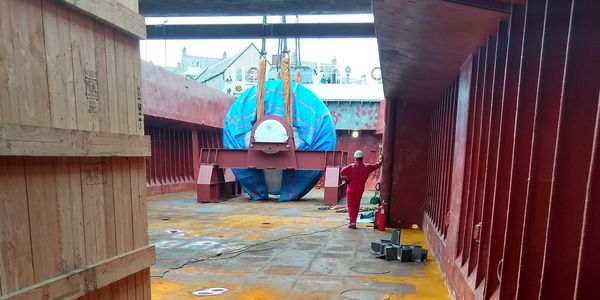 A.A Simpson Maritime Buckie Harbour Crane Lifts Substation equipment from Cargo Boat