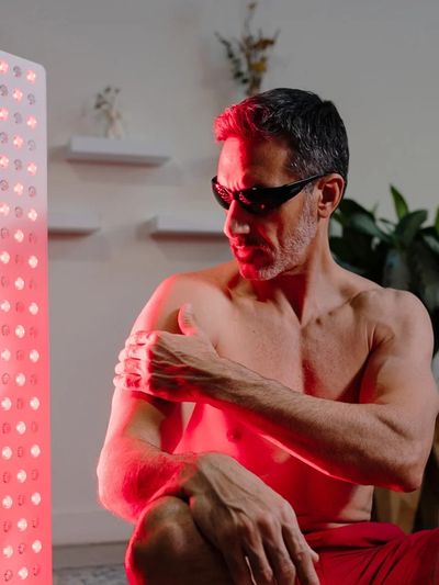 man getting red light therapy