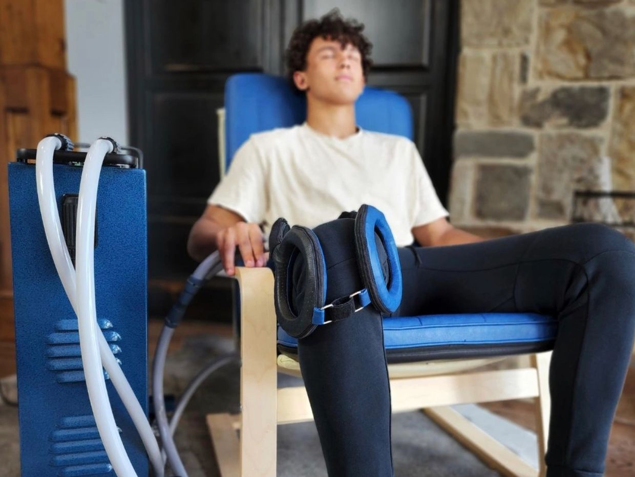 Young man getting PEMF therapy 