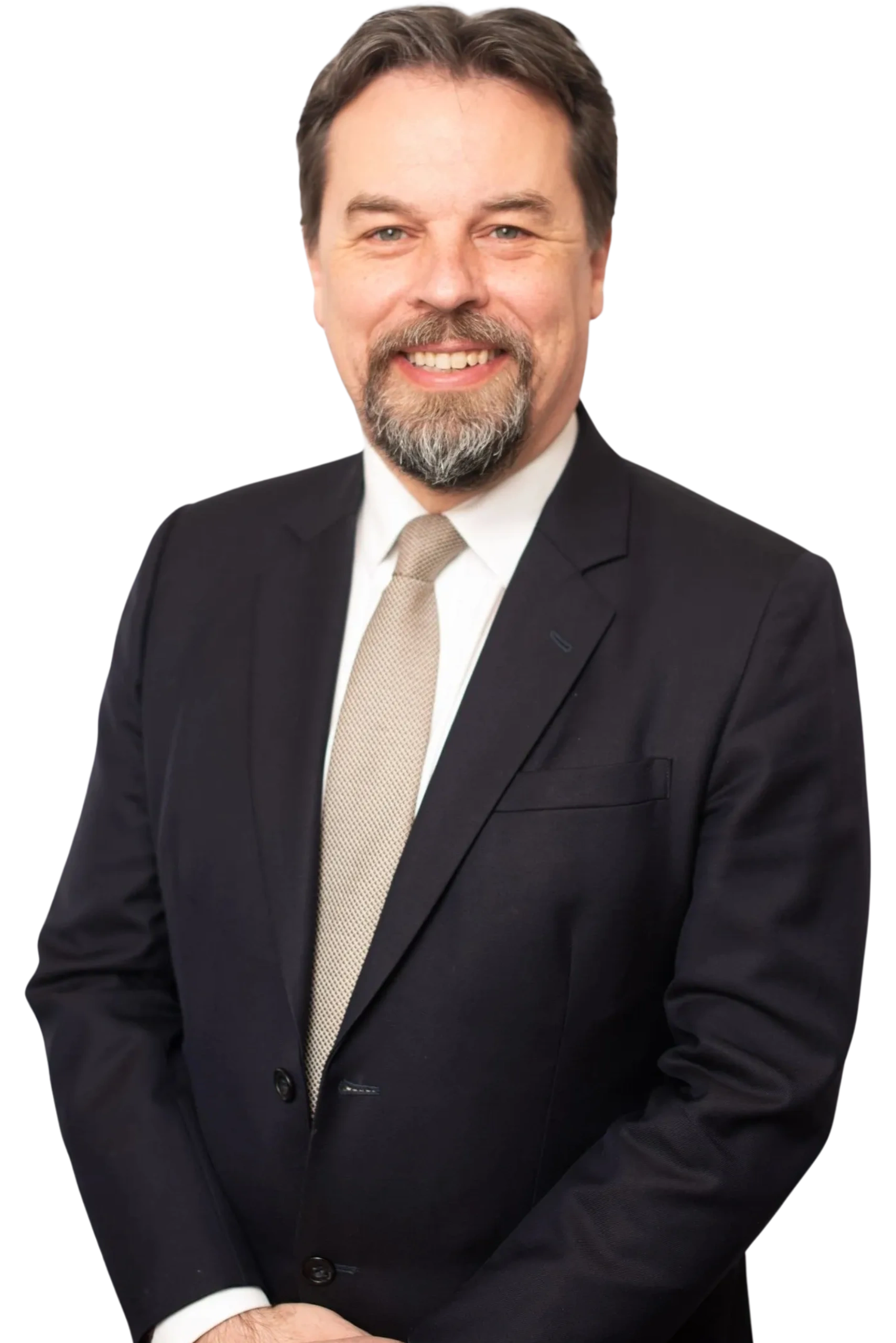 Smiling man in a suit and tie.