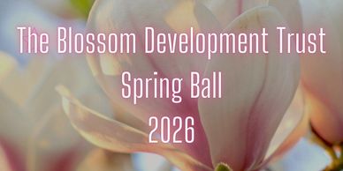 Invitation for The Blossom Development Trust Spring Ball 2026 with a floral background.
