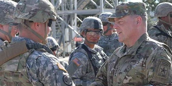 CS Armor, CEO, receiving a coin in the US Army.