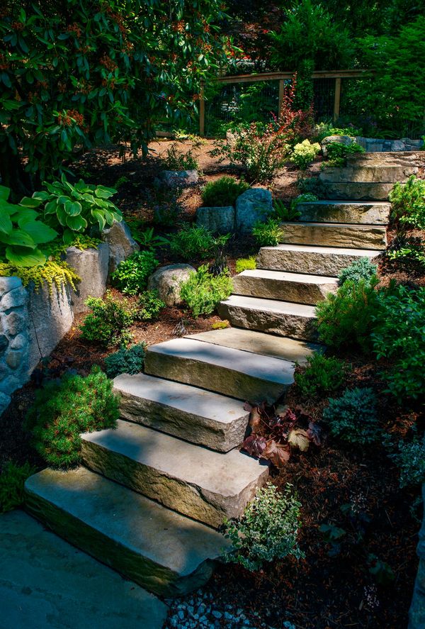 Basalt stone stair treads leading to pennsylvania bluestone patio, planting, walkways, outdoor stair