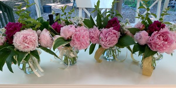 Small arrangements in mason jars for a baby shower. $15 each plus delivery.