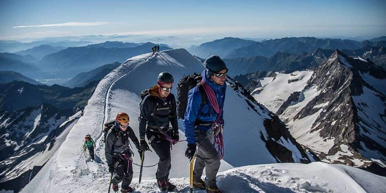 guided group climbing mountain