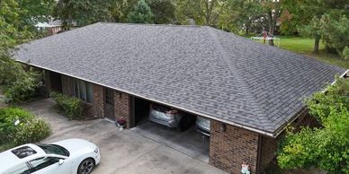 Roof replacement and storm damage roofing services by Premier Construction in Washington, Iowa.