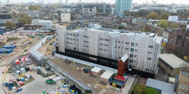 A large industrial building in an urban area.