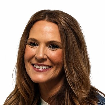 Smiling woman with long brown hair against white background.