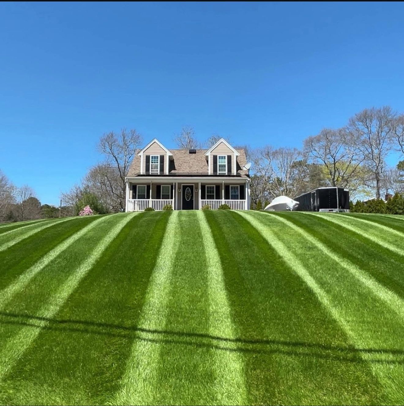 Commercial lawn mowing with clean stripes in Lexington & Nicholasville , KY