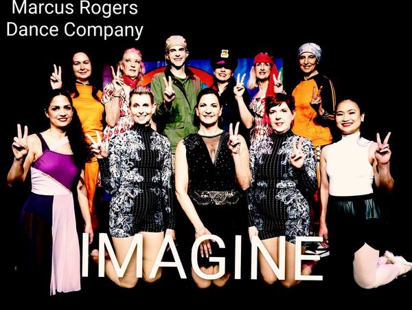 Marcus Rogers Dance Company group posing with peace signs and 'IMAGINE' text.