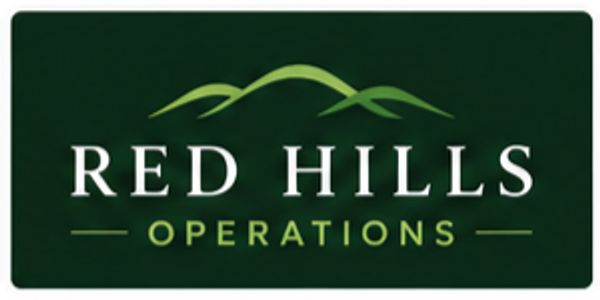 Logo of Red Hills Operations with green hills graphic.
