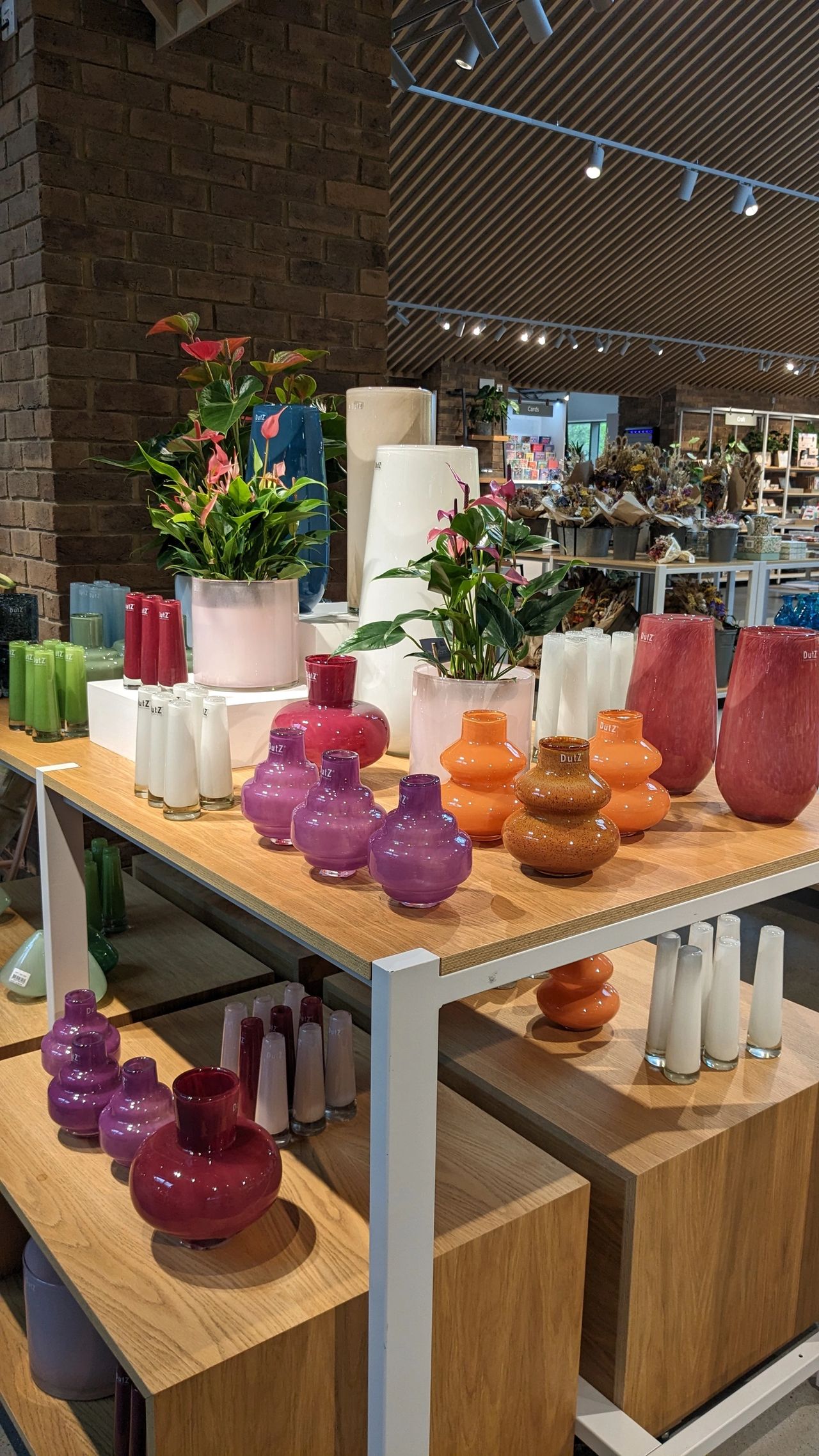 Elevate your home décor with colourful and colour luxury DutZ vases available from RHS Royal Horticultural Society Wisley: handcrafted glassware, pots, bowls, and candleholders, offering unrivaled elegance for garden centres and flower shops.