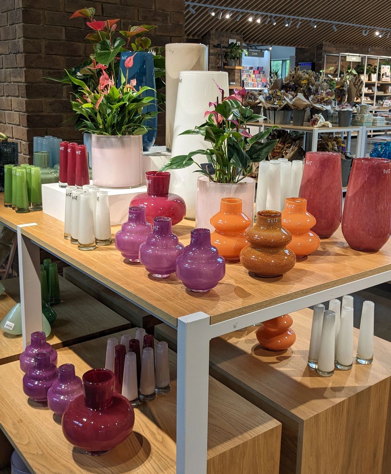Elevate your home décor with colourful and colour luxury DutZ vases available from RHS Royal Horticultural Society Wisley: handcrafted glassware, pots, bowls, and candleholders, offering unrivaled elegance for garden centres and flower shops.