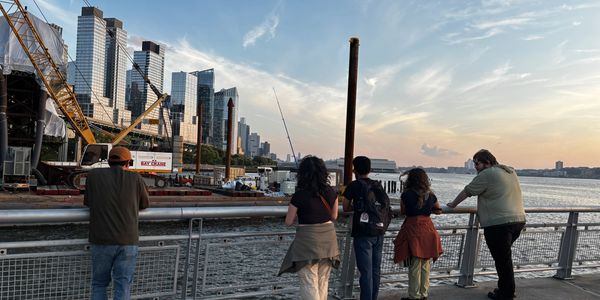 Group of people fishing in the Hudson River