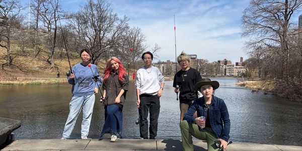 Group of people fishing in Central Park