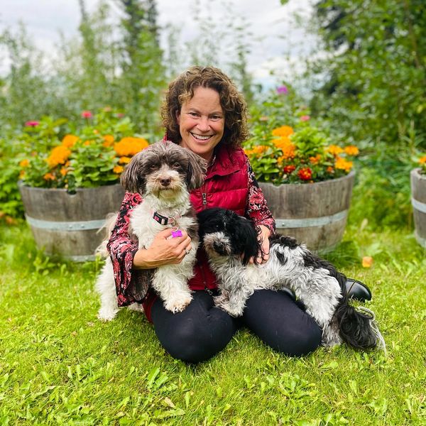 Photo of Kathy with Daisy and Winston