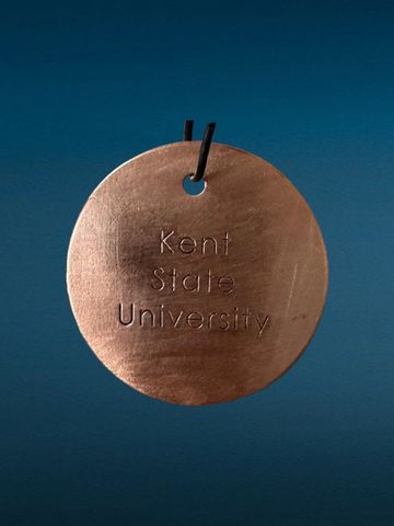 Round medal with 'Kent State University' engraving.