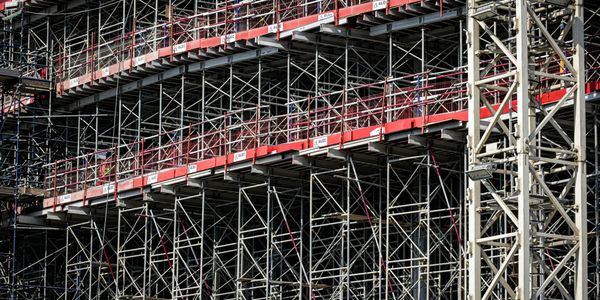 Extensive scaffolding structure on a construction site.