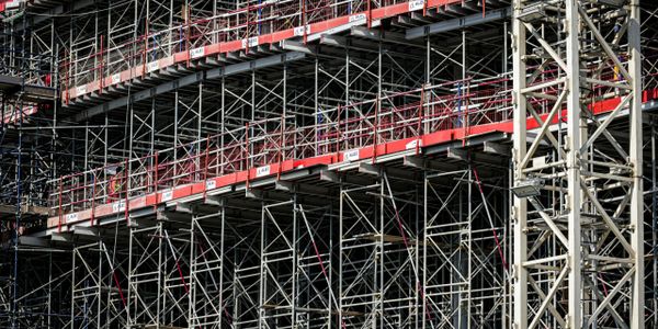 Extensive scaffolding structure on a construction site.