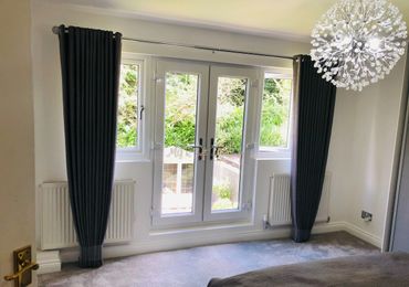 Large window with Eyelet Curtains