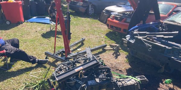 Most Recent Job:   Engine swap, Patrick took an out a 99or00 mach mustang motor and transmission and