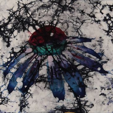 A batik of a blue coneflower.