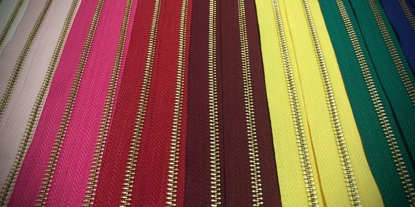 Decorative metal zippers