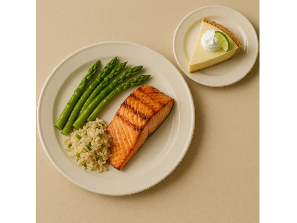 A typical dinner: salmon filet, asparagus spears, rice pilaf & a slice of key lime pie.