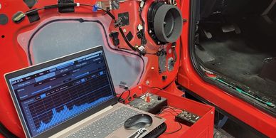 Tuning stereo system with laptop.