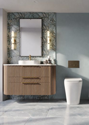 Teal powder bathroom with large patterned tiles