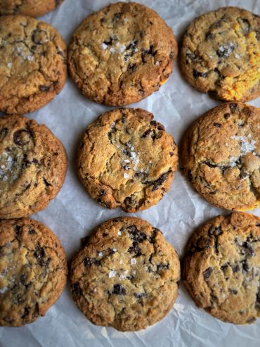 Fresh chocolate chip cookies with sea salt.