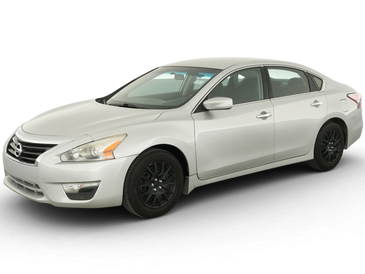 A white sedan car with black wheels.