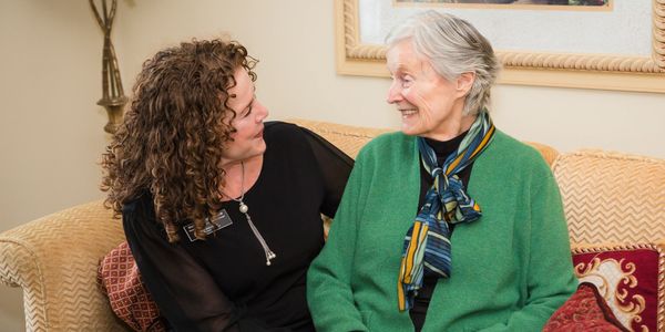 Two People smiling at  each other