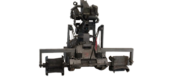 A large, industrial machine with multiple components and a metallic frame.
