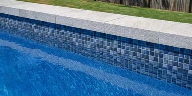 Pool mosaics, coping tiles, bullnosed and ceramic tiles 