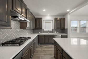 Interior photo of Designer kitchen in a luxury real estate listing of a new construction home in DFW.