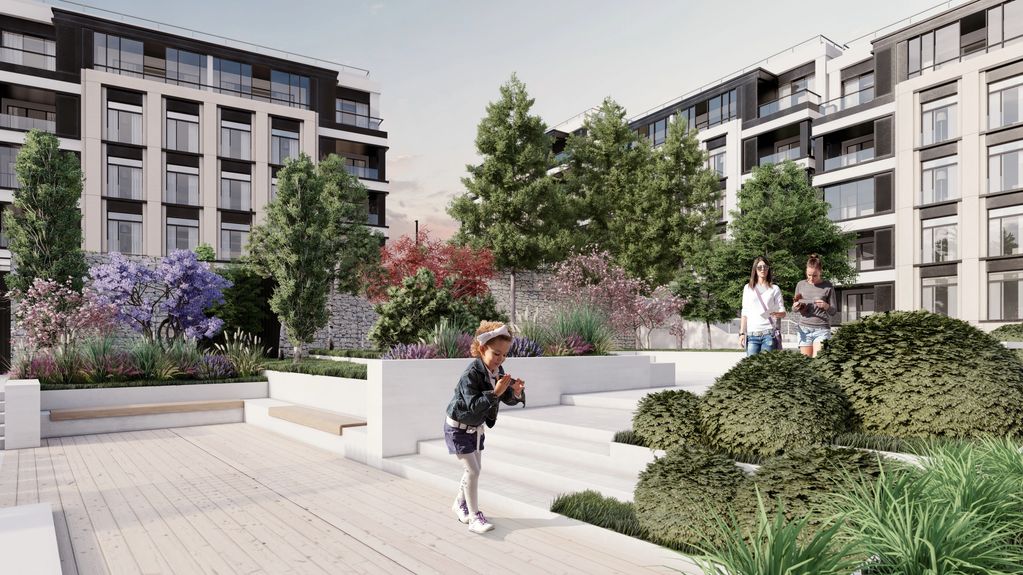 Modern residential courtyard with greenery and people enjoying the space.