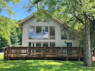 Exterior of Redbud Cabin with large windows at Star Point Resort on Dale Hollow Lake