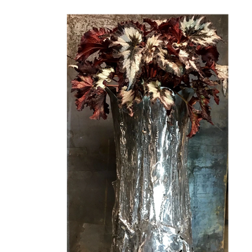 a four foot tall 
Iron flower stand..
in a private collection