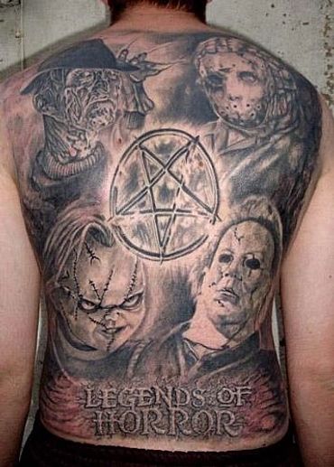 Back tattoo featuring horror icons and pentagram.
