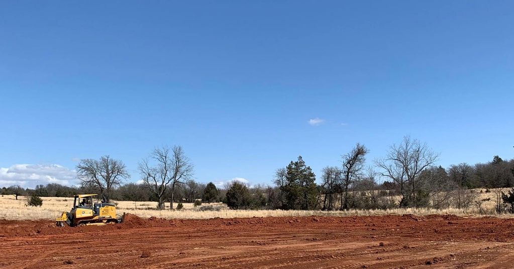 grading clearing site preparation excavating dozer bulldozer building construction