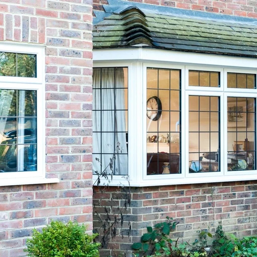 white upvc bay windows with eaded glass units a rated