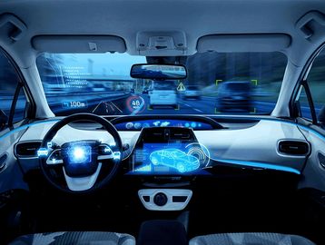Futuristic car interior with digital dashboard and autonomous driving features.
