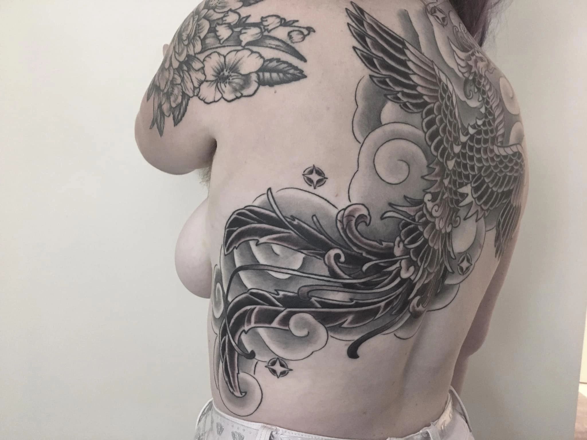 phoenix tattoo
sexy tattoo
woman tattoo