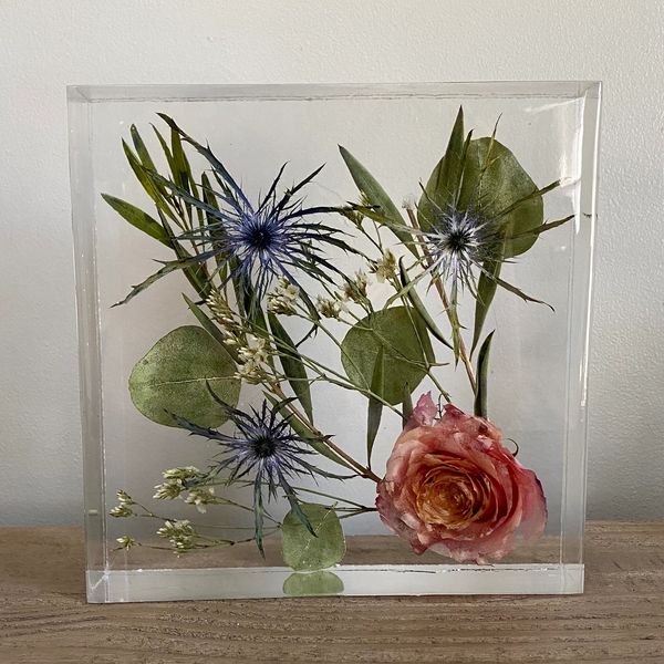 large resin block with preserved wedding flowers
