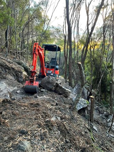 MTB Trail work on the small excvator 