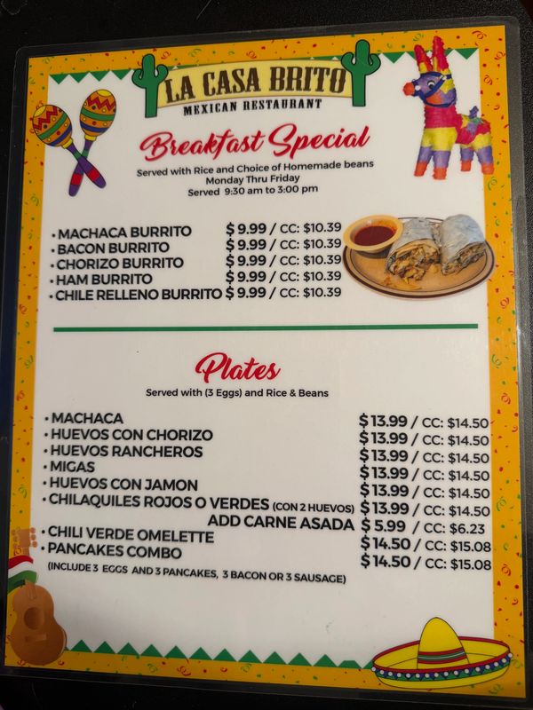 Menu board of La Casa Brito Mexican Restaurant's breakfast specials and plates with prices.