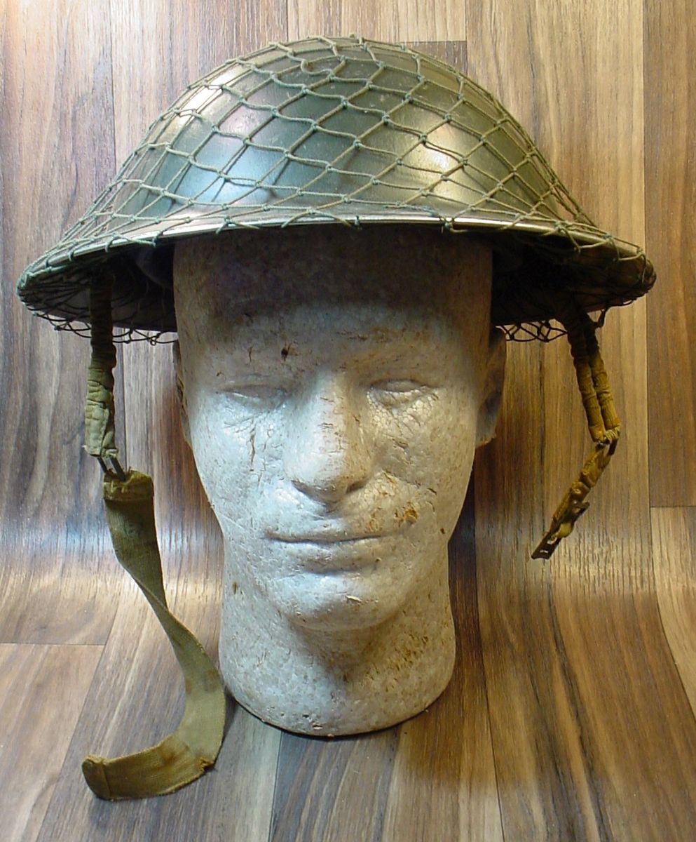 WWII BRITISH BRODIE HELMET WITH CAMO NET 1943, Item 2800