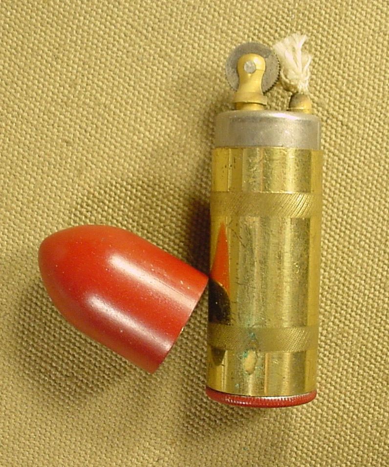bullet cigarette lighter VINTAGE BULLET SHAPED CIGARETTE LIGHTER Item #0071