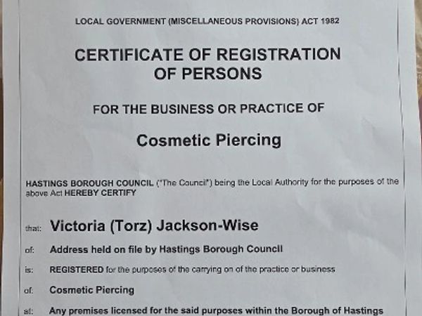Certificate of registration for cosmetic piercing business by Victoria Jackson-Wise.